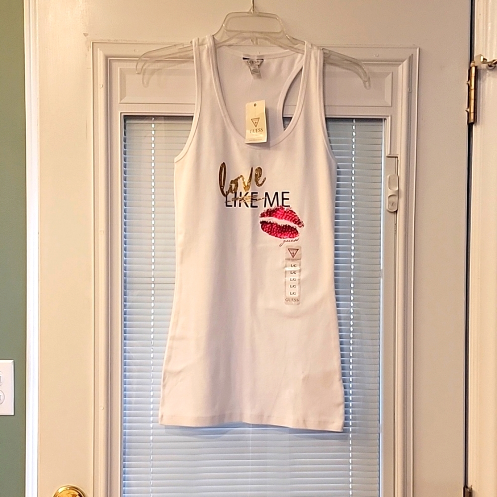 Long white racer back tank top by Guess. Size Large